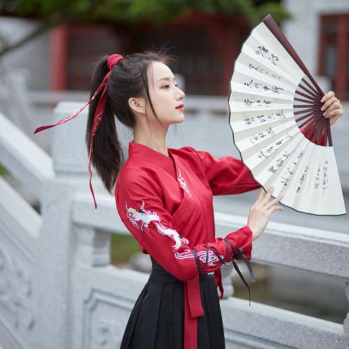 Beautiful Young Lady in Traditional Chinese Clothing, and a Handsome Guy with Her-2